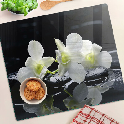 Doska na krájanie Orchidey na čiernom pozadí