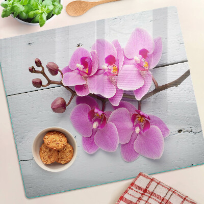 Doska na krájanie Orchidey na bielom pozadí