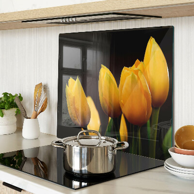 Sklenená doska na krájanie Žlté tulipány na čiernom pozadí