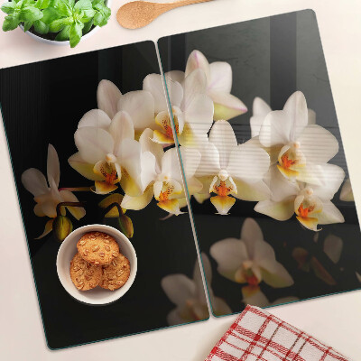 Doska na krájanie Orchidey na čiernom pozadí