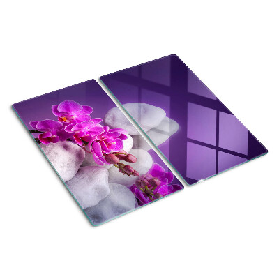 Doska na krájanie Kvety orchideí na pozadí kameňov