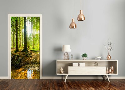 Fototapeta na dvere samolepiace slnka v lese
