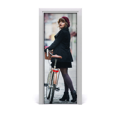 Fototapeta samolepiace dvere žena na bicykli