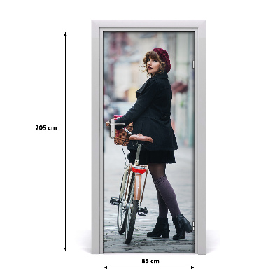 Fototapeta samolepiace dvere žena na bicykli