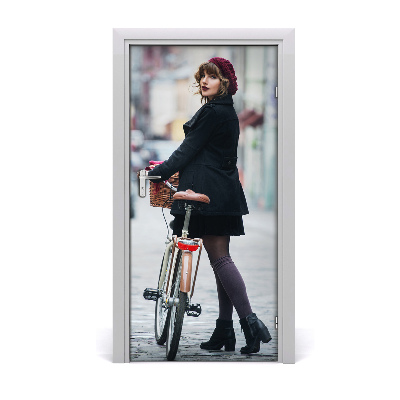 Fototapeta samolepiace dvere žena na bicykli