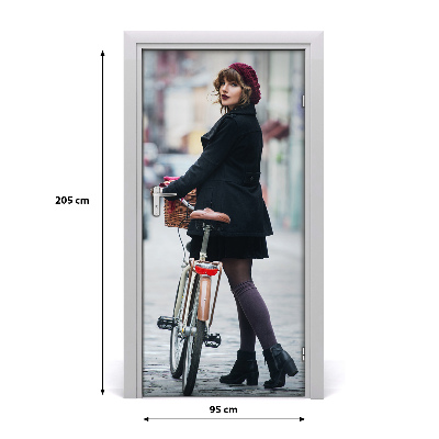 Fototapeta samolepiace dvere žena na bicykli