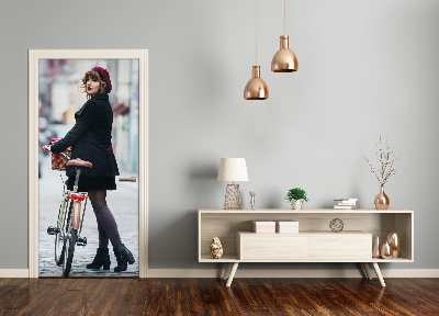 Fototapeta samolepiace dvere žena na bicykli