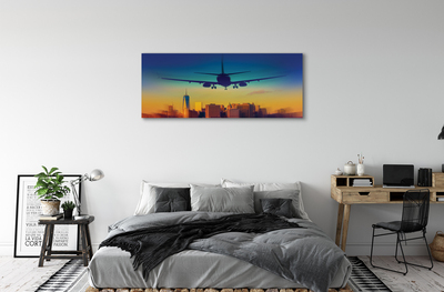 Obraz canvas Veľkomesto oblačnosti lietadlo západ