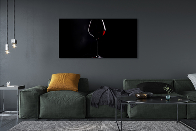Obraz canvas Čierne pozadie s pohárom vína