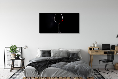 Obraz canvas Čierne pozadie s pohárom vína