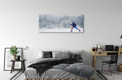 Obraz canvas Les v zime sneh muž