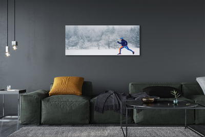 Obraz canvas Les v zime sneh muž