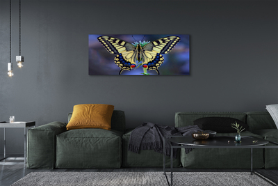 Obraz na plátne Motýľ na kvetine