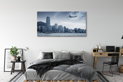 Obraz canvas Lietadiel mraky město