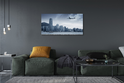 Obraz canvas Lietadiel mraky město