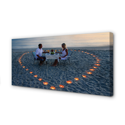 Obraz canvas Srdce s pár sviečok mora
