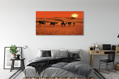 Obraz canvas Ťavy ľudí púštne slnko neba
