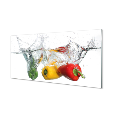 Obraz na skle Farebné papriky vo vode