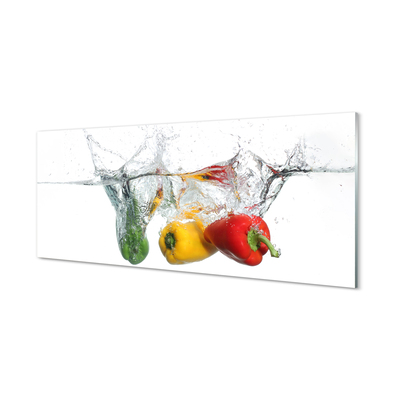 Obraz na skle Farebné papriky vo vode