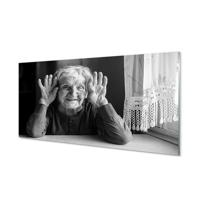Obraz na skle staršia žena