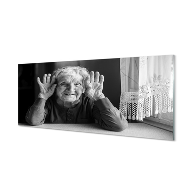 Obraz na skle staršia žena