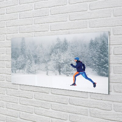 Obraz na skle Les v zime sneh muž