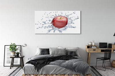 Obraz na skle Červené jablko vo vode