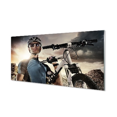 Obraz na skle Cyklista na bicykli mraky