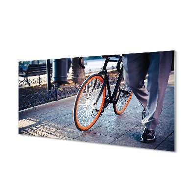 Obraz na skle Mesto na bicykli noha
