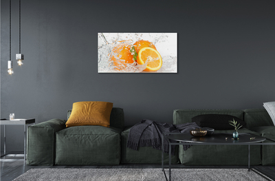 Obraz na skle Pomaranče vo vode