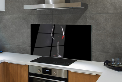 Sklenený obklad do kuchyne Čierne pozadie s pohárom vína