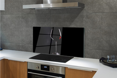 Sklenený obklad do kuchyne Čierne pozadie s pohárom vína