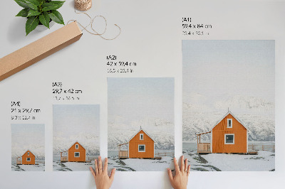 Poster na stenu Minimalistický rám oranžového domu v zasnežených horách