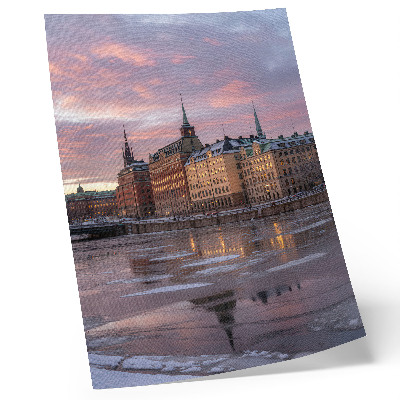 Plagát panoráma mesta pri západe slnka úlomky ľadu