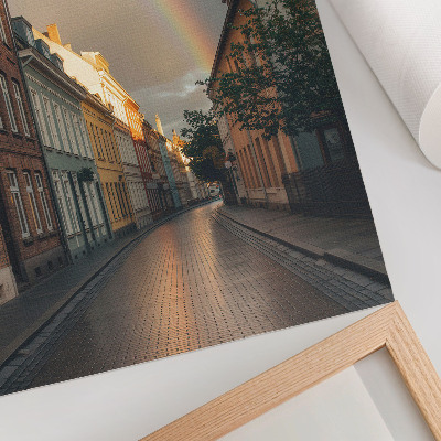 Poster na stenu Farebné činžiakové domy, dúha, zamračená obloha