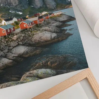 Plagát na stenu červené domy pri fjorde počas západu slnka s horami v pozadí