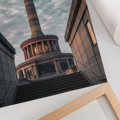Poster na stenu Elegantný stĺp s anjelom a moderná architektúra