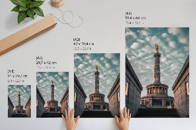 Poster na stenu Elegantný stĺp s anjelom a moderná architektúra