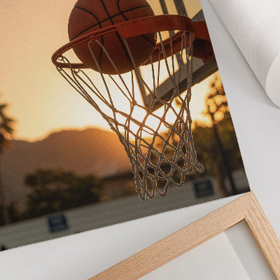 Plagát Energická basketbalová lopta pri západe slnka