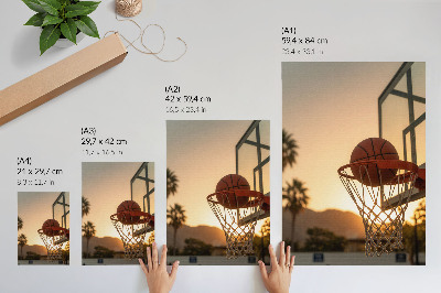 Plagát Energická basketbalová lopta pri západe slnka