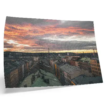 Retro plagát západ slnka nad farebnou panorámou mesta