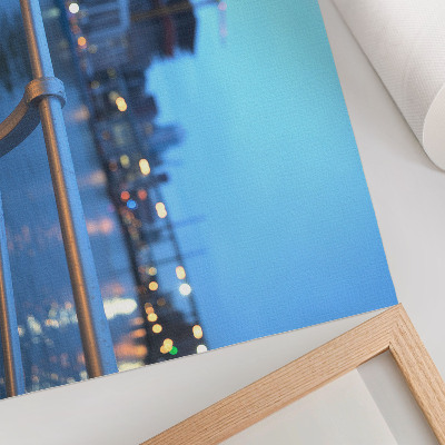 Poster Mestské nábrežie večer s rozmazanými svetlami