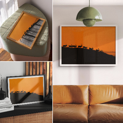 Retro plagát Siluety jeleňov na kopci s oranžovým pozadím