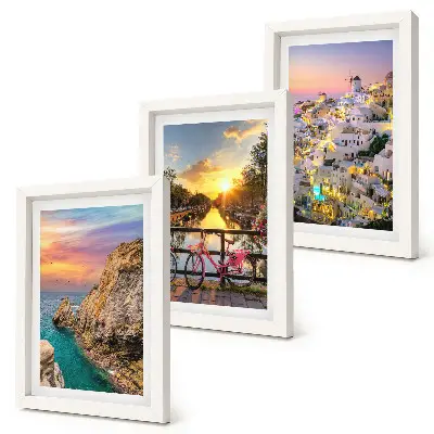 Výhľad na more so západom slnka a mestom triptych v ráme