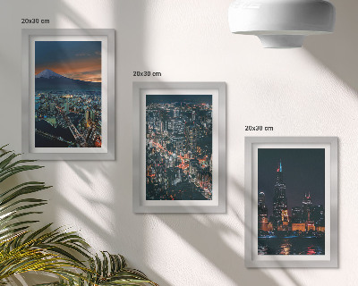 Triptych v ráme Výhľad na hory mesta v noci s mrakodrapmi