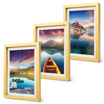 Triptych v ráme Pokojné jazerá s horskou scenériou a loďkou