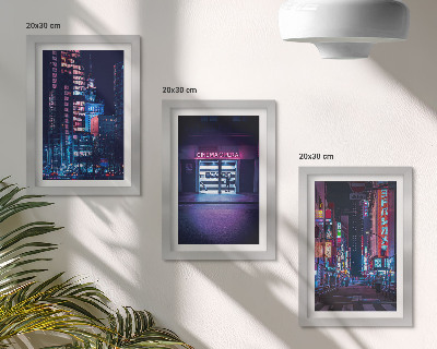 Triptych v ráme Nočné mesto s neónovými svetlami a vchodom do kina