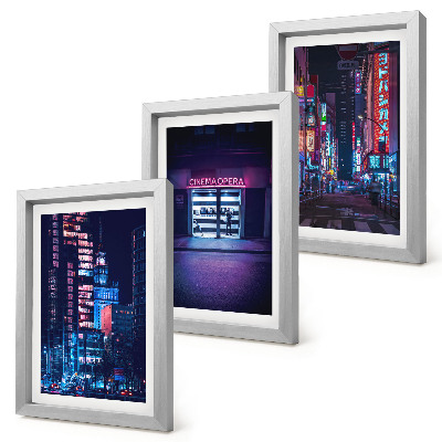 Triptych v ráme Nočné mesto s neónovými svetlami a vchodom do kina