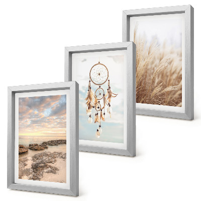 Triptych v ráme Výhľad na more s oblakmi, lapačom snov a trávou