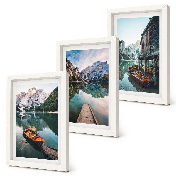 Triptych v ráme Jazero v horách s loďkami a drevenou chatrčou